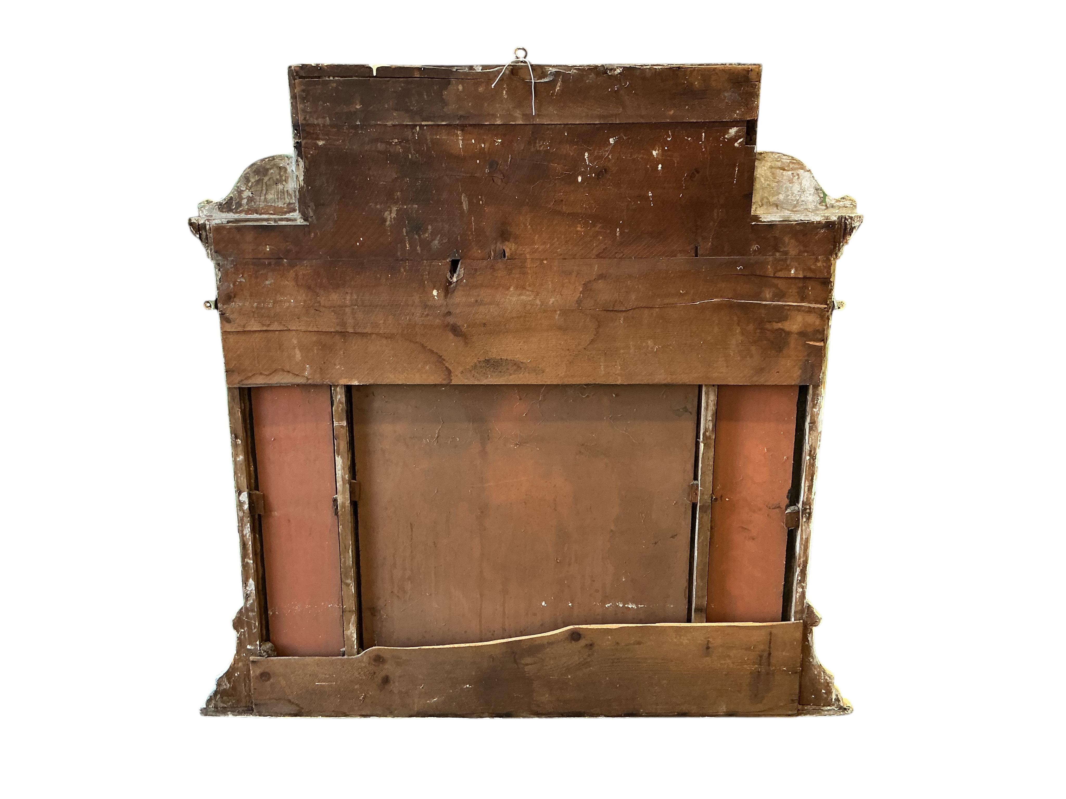 A Victorian overmantel mirror, later painted, width 116cm, height 123cm.